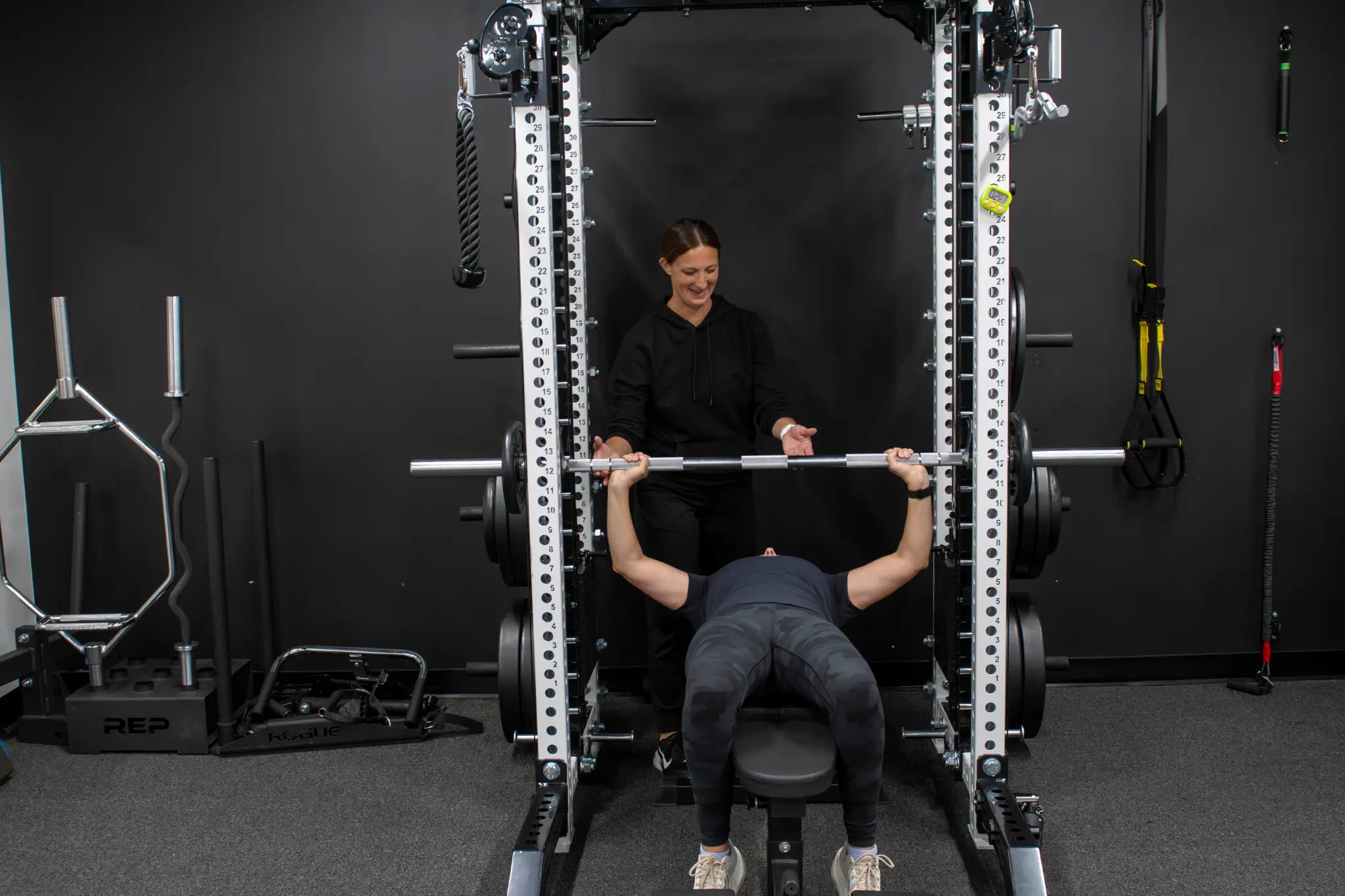 Jessica Freiss spotting a client during an ANTIOX strength-training session