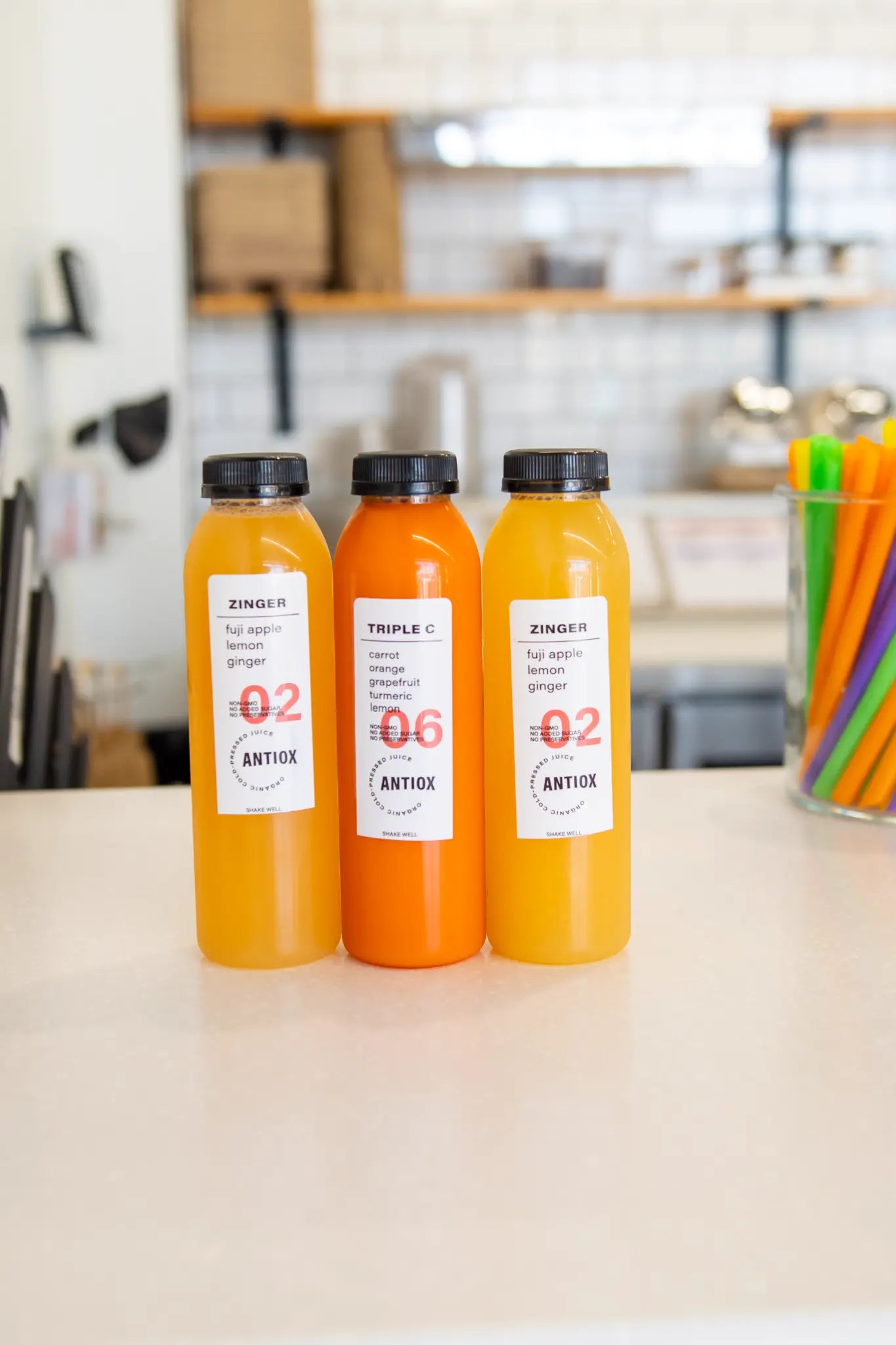 Three bottled ANTIOX juices displayed at the Hagerstown bar